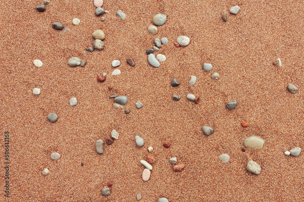background beach with sand with pebbles with place for an inscription