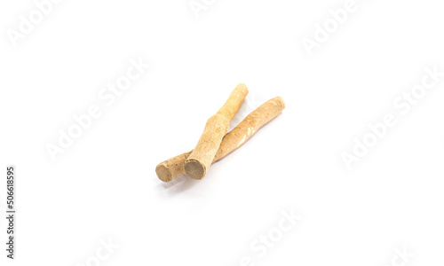 Natural toothbrush Miswak isolated on white background photo