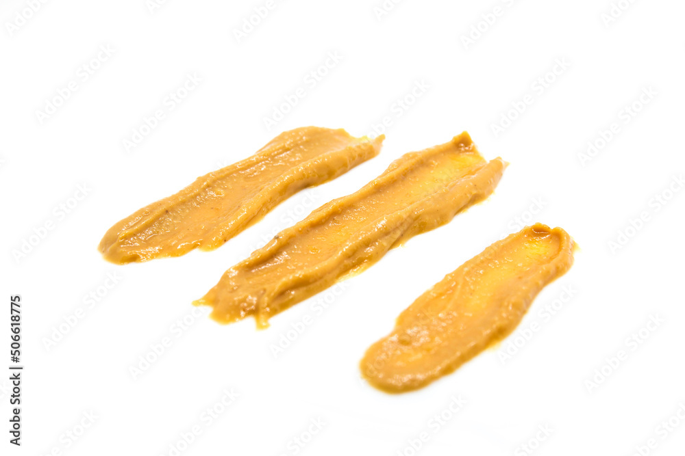 Peanut butter spread isolated on white background Peanut butter spread isolated on white background