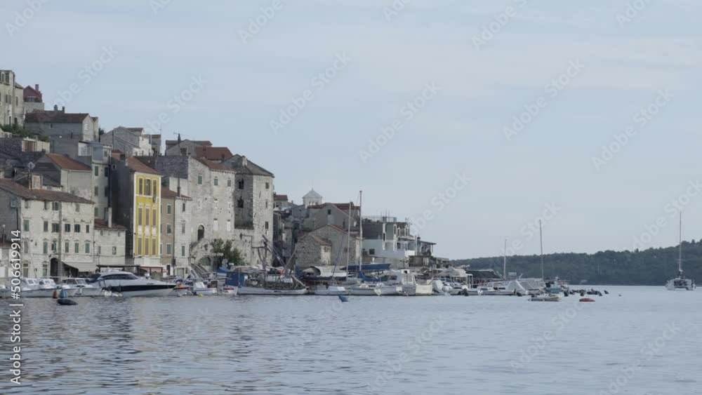 Old Stone Waterfront Buildings and Boats in Marina, Sibenik, Croatia Cityscape Old Stone Waterfront Buildings and Boats in Marina, Sibenik, Croatia Cityscape