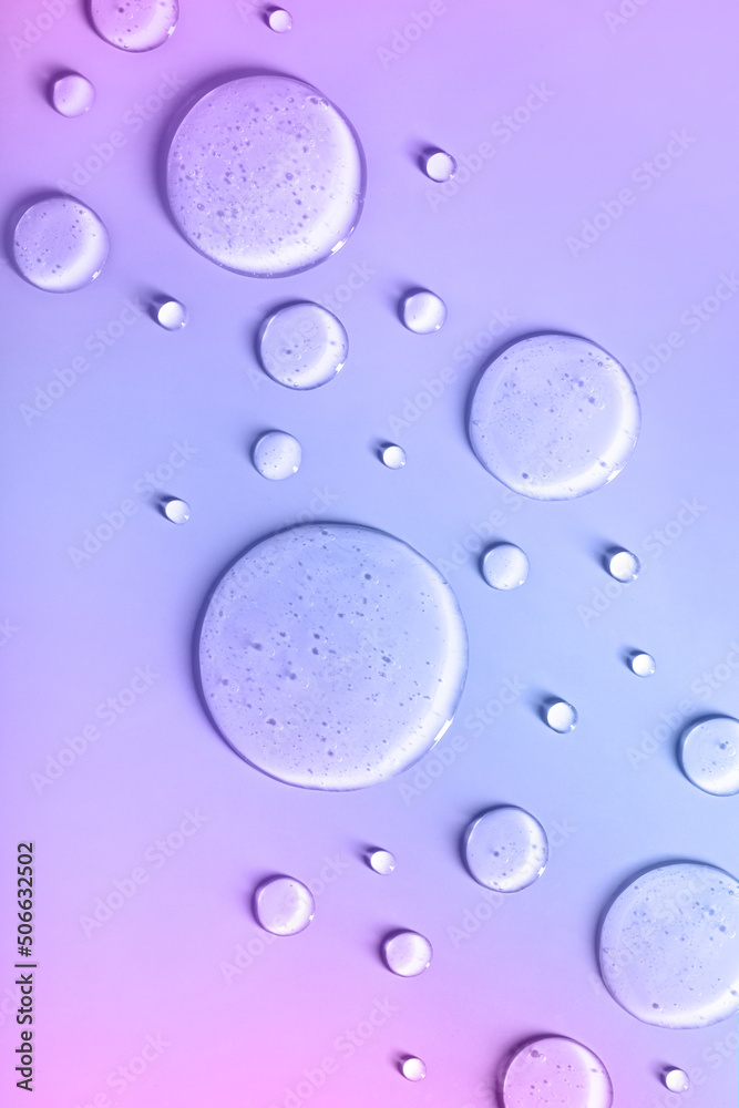 round drops of transparent gel serum