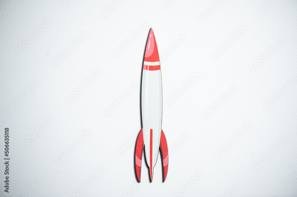 Obraz premium Wood rocket shape, white background