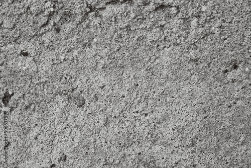 Fototapeta Naklejka Na Ścianę i Meble -  Macro texture of rough concrete. The background of concrete.