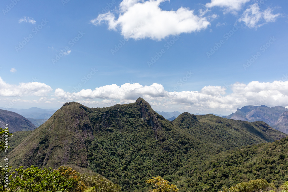 View of the golden hole stone, famous mountain with two parallel peaks, in Teresópolis surroundings, Rio de Janeiro, Brazil
