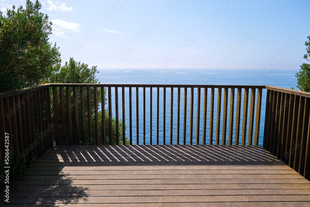 Viewpoints and walkways to look at the sea from the top of a balcony, on a sunny summer day. Viewpoints and walkways to look at the sea from the top of a balcony, on a sunny summer day.