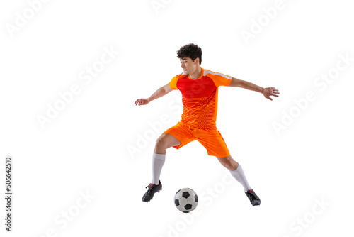 Professional football, soccer player in motion isolated on white studio background. Concept of sport, match, active lifestyle, goal and hobby © master1305