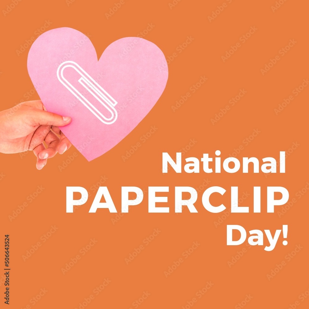 Caucasian woman hoding heart shaped paper by national paperclip day text on orange background