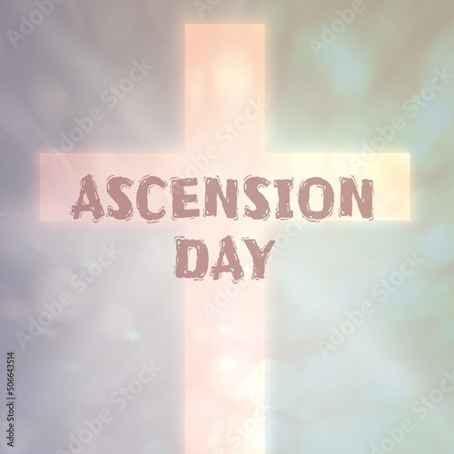 Composite of ascension day text and cross against cloudy sky, copy space