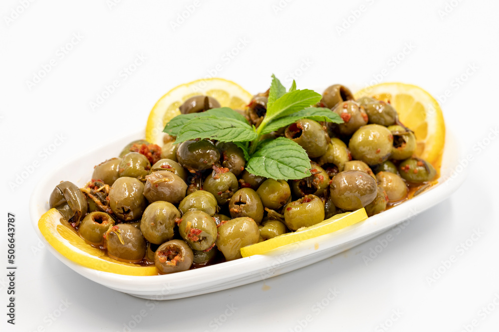 Green olive. Olives with special sauce isolated white background. Healthy food. close up Green olive. Olives with special sauce isolated white background. Healthy food. close up