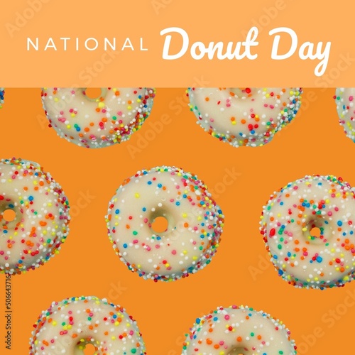 Digital composite image of national donut day text by sweets on coral colored background