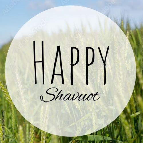 Digital composite image of shavuot text on wheat field during sunny day