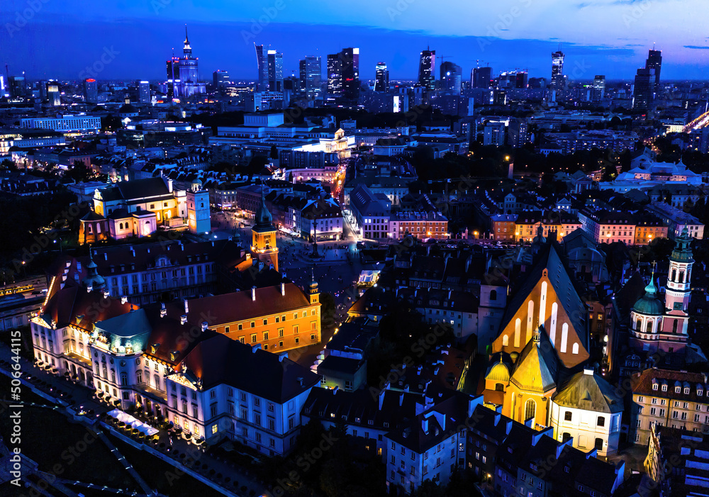 Warsaw, Poland  Cityscape with high angle above aerial view of historic architecture buildings in old town market square at night