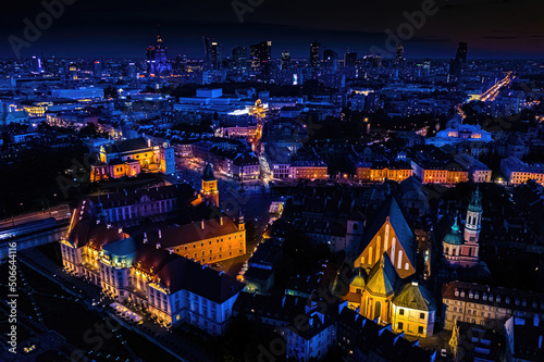 Warsaw, Poland Cityscape with high angle above aerial view of historic architecture buildings in old town market square at night