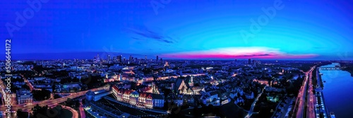 Warsaw, Poland Cityscape with high angle above aerial view of historic architecture buildings in old town market square at night