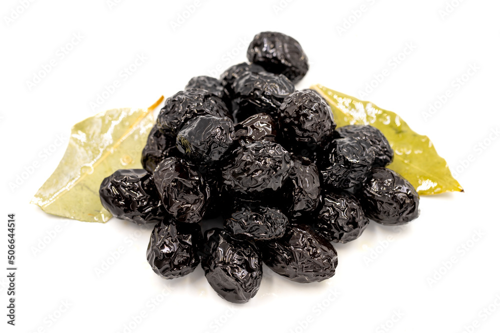 Black olive. Natural black olive on isolated white background. Healthy food. close up Black olive. Natural black olive on isolated white background. Healthy food. close up