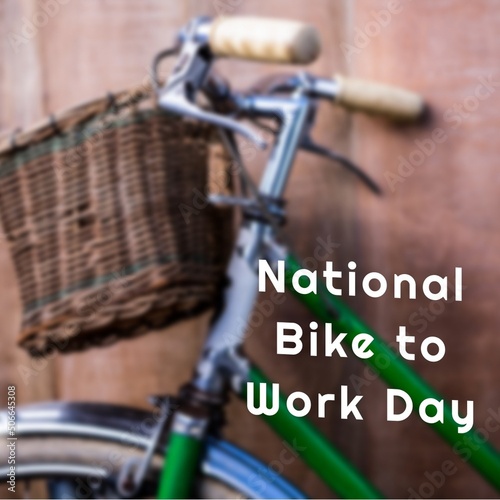 Digital composite image of national bike to work day text and bicycle against wall