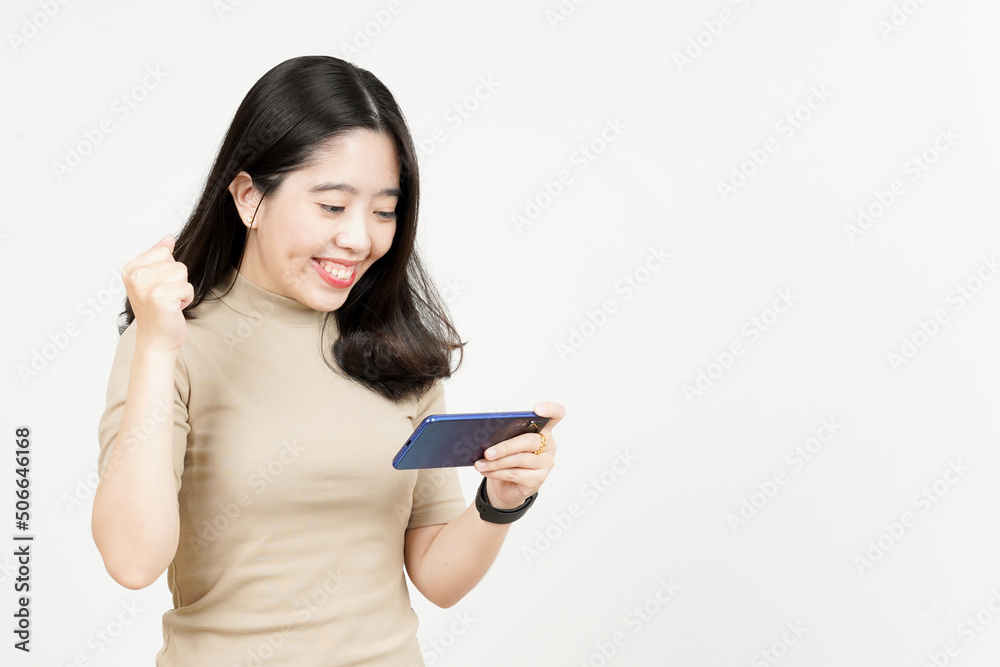 Playing Mobile Game on Smartphone Of Beautiful Asian Woman Isolated On White Background Playing Mobile Game on Smartphone Of Beautiful Asian Woman Isolated On White Background