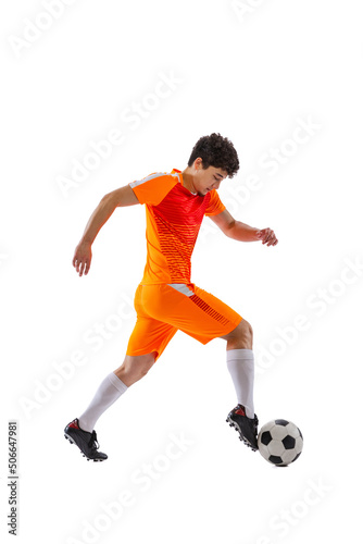 Professional football, soccer player in motion isolated on white studio background. Concept of sport, match, active lifestyle, goal and hobby © master1305