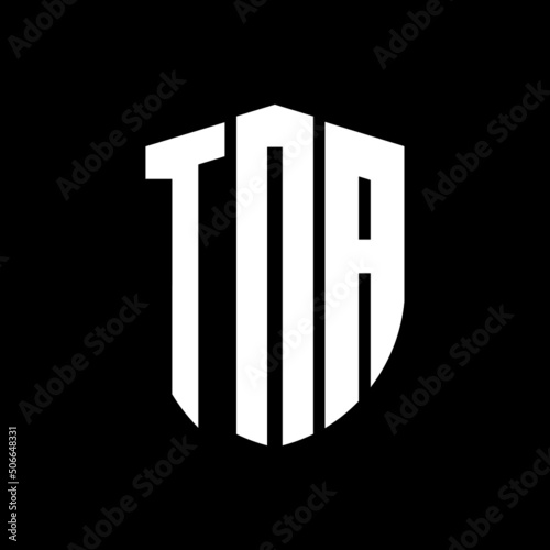 TNA letter logo design. TNA modern letter logo with black background. TNA creative  letter logo. simple and modern letter logo. vector logo modern alphabet font overlap style. Initial letters TNA  photo