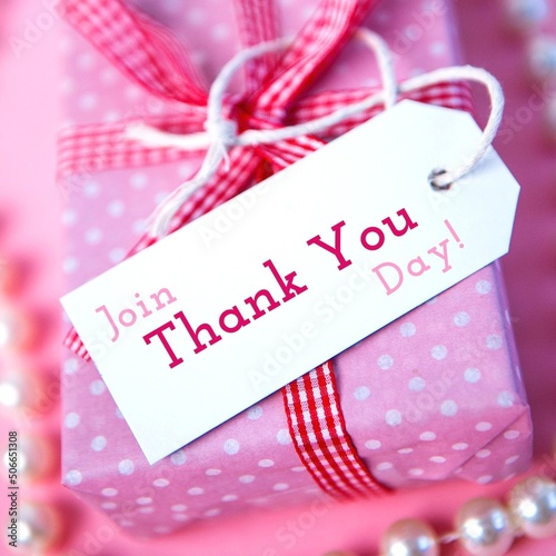 Digital composite image of pink gift box with label and join thank you day text , copy space