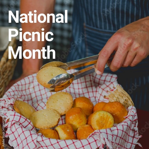 National picnic month text over midsection of caucasian man holding bun with serving tongs
