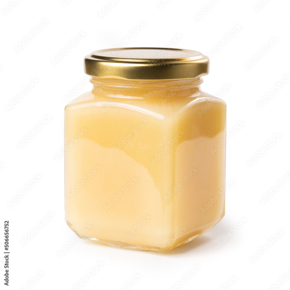Honey Jar - Square, Cube Glass Victorian Jar with Golden Lid - White Light Honey - Macro Close Up on Foam - Isolated on White Background Honey Jar - Square, Cube Glass Victorian Jar with Golden Lid - White Light Honey - Macro Close Up on Foam - Isolated on White Background