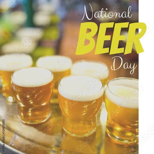 Digital composite image of alcoholic beverages served with national beer day text in bar