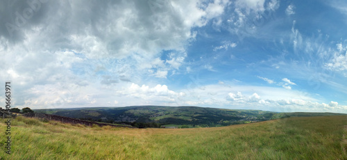 wide panoramic view of the calder valley showing hebden bridge, heptonstall and old town surrounded by west yorkshire countryside