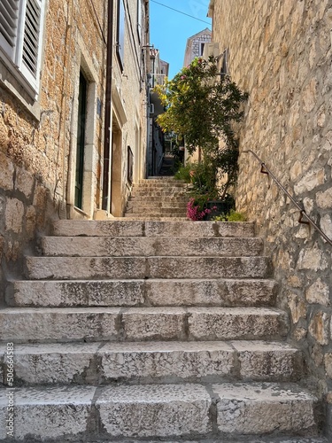 Old alley in Hvar Town, Croatia photo