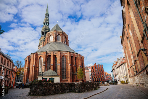 Riga, Latvia, 14 October 2021: St. Peter's church or cathedral with clock and bell tower, parish church of the Evangelical Lutheran, Northern Gothic Style with octagonal spire, tallest spire 