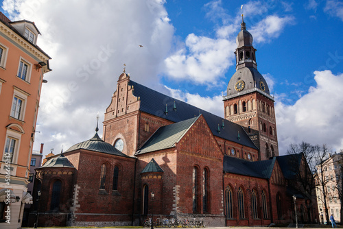 Riga, Latvia, 14 October 2021: Cathedral Church of Saint Mary, seat of the Archbishop, Evangelical Lutheran Dome cathedral with tower and weathercock, old town at sunny day