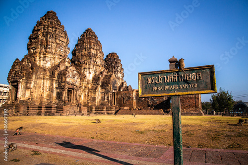Pra Prang Sam Yod or Phra Prang Sam Yot ruin temple with monkeys, in Lopburi, Thailand