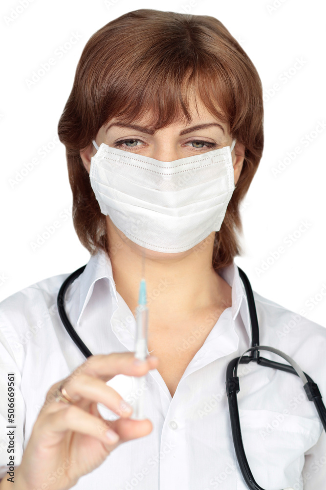 Closeup of a female doctor with syringe Closeup of a female doctor with syringe