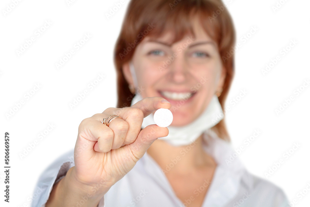 Female doctor holding a pill, medical treatment, drugs and healthcare concept