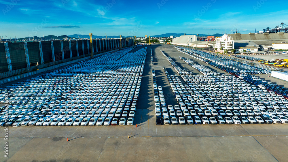 Aerial view a lot of new car for import and export shipping by ship; Smart dealership at car depot; Car at car park before shipping to customer; Car after production at Smart Factory industry 
