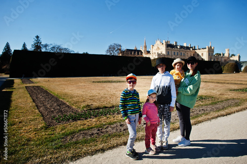 Mother with four kids at Lednice park, Czech Republic. photo