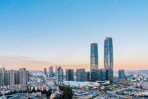 Dusk scenery of the twin towers and city skyline of Kunming, Yunnan, China