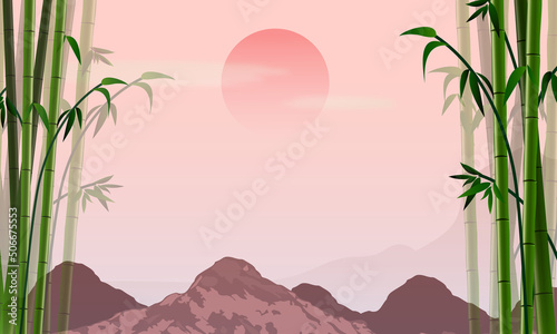 Green bamboo forest and red sunset in the midst of mountains