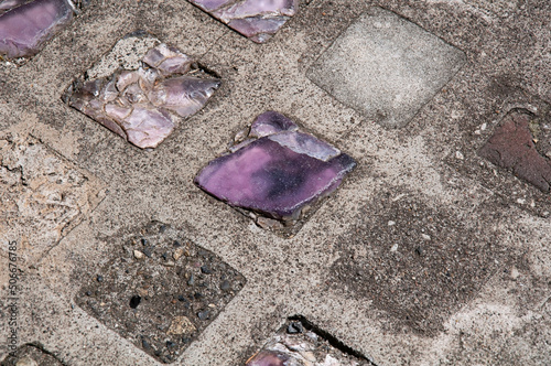 Purple bricks in path path of concrete or cement of amethyst color, great textures.