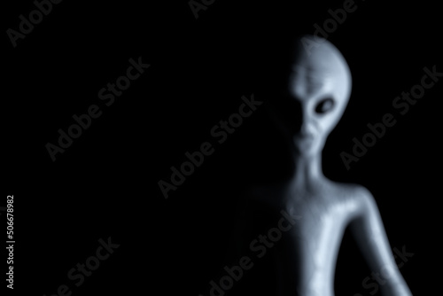 Blurred Background Scary Gray Humanoid Alien. 3d Rendering