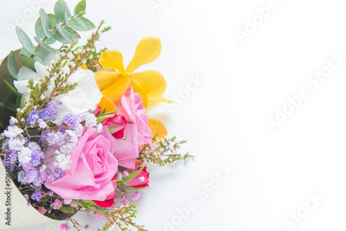 Beautiful and romantic bouquet on white background (rose, orchid, bellflower, gypsophila)