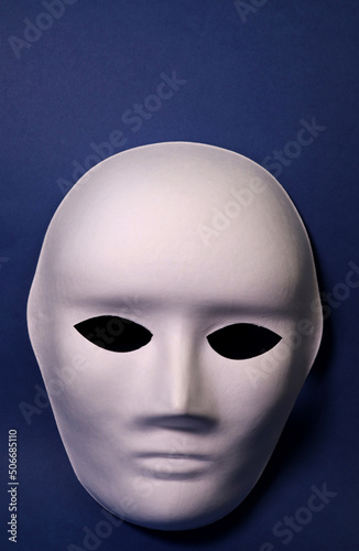 white mask on blue background
