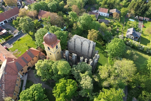 Unfinished Gothic cathedral of Our Lady founded in the 12-th century in the village Panensky Tynec, Czech republic,Europe - magical place full of natural healing Energy,aerial landscape panorama view photo