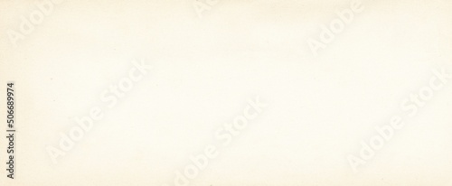 Old brown paper parchment background design with distressed vintage stains and ink spatter and white faded shabby center, elegant antique beige color