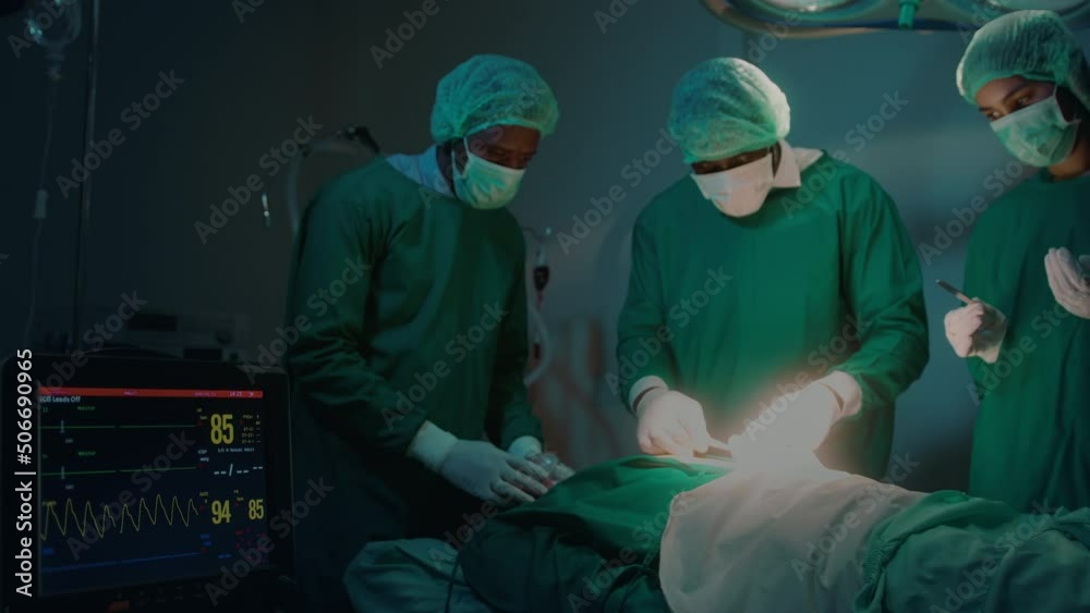 Group of mixed-races professional surgeons operating in hospital operating room , health care concept. Group of mixed-races professional surgeons operating in hospital operating room , health care concept.