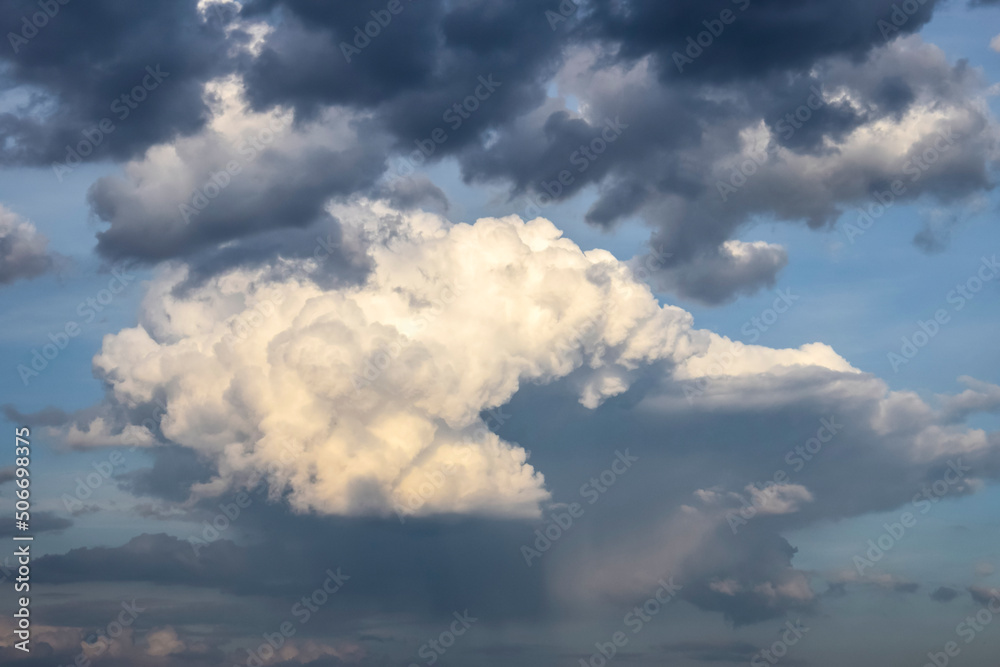 Picturesque sky with thunderstorms cumulus clouds. Overcast sky with big clouds. Air clouds background. Copy space. Soft focus