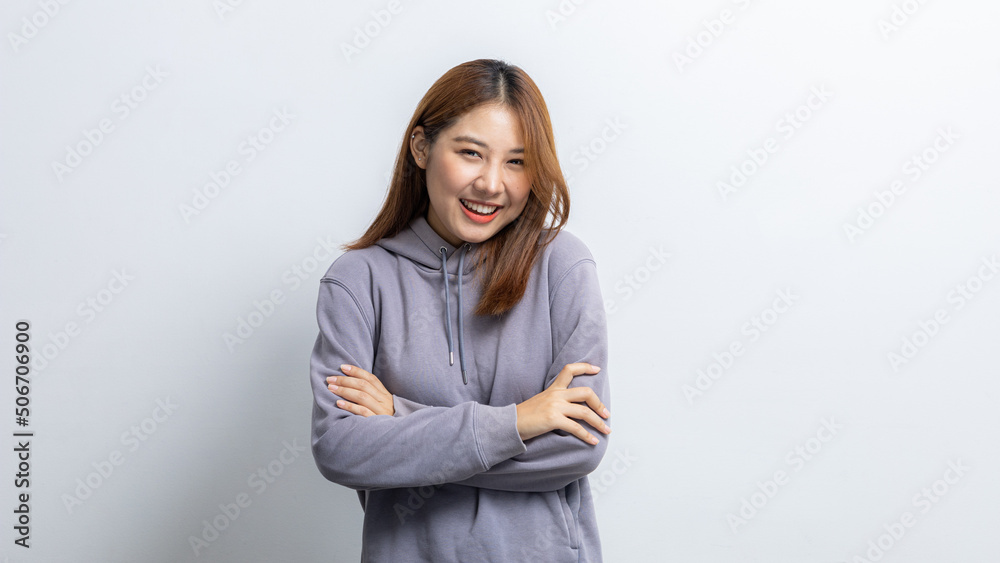 Portrait of beautiful Asian woman doing cheerful pose on isolated yellow background, portrait concept used for advertisement and signage, isolated over white background, copy space. Portrait of beautiful Asian woman doing cheerful pose on isolated yellow background, portrait concept used for advertisement and signage, isolated over white background, copy space.