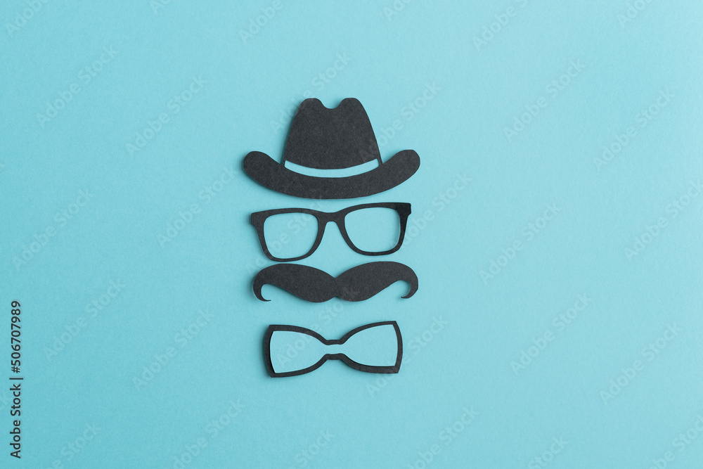 Cut paper figures on blue background. Father's day concept. Man's day. Copy space. Cut paper figures on blue background. Father's day concept. Man's day. Copy space.