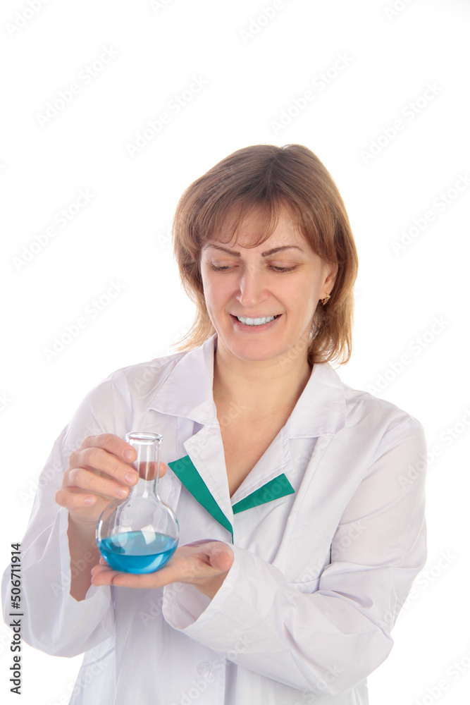 Female scientist examining a chemical reaction in a flask Female scientist examining a chemical reaction in a flask