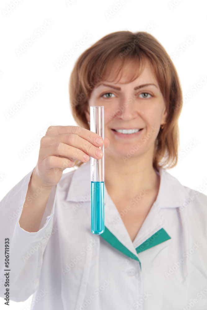 Female scientist examining a chemical reaction in a test tube Female scientist examining a chemical reaction in a test tube
